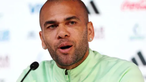 DOHA, QATAR – DECEMBER 01: Dani Alves of Brazil speaks during the Brazil Press Conference at the Main Media Center on December 01, 2022 in Doha, Qatar. (Photo by Mohamed Farag/Getty Images)