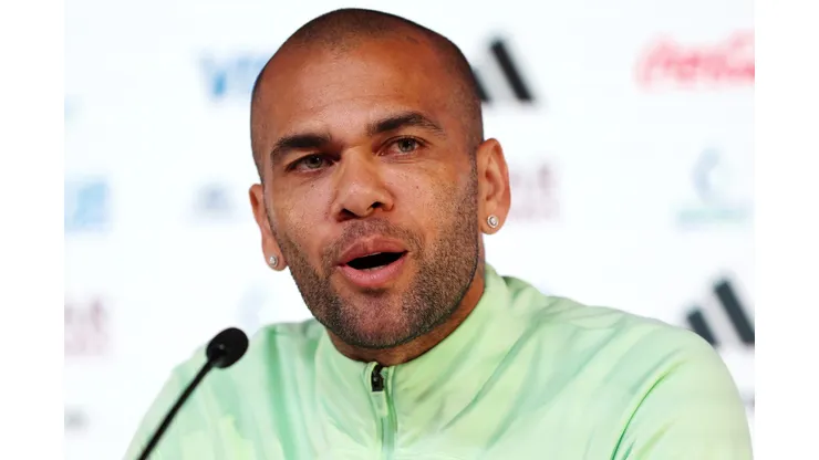 DOHA, QATAR - DECEMBER 01: Dani Alves of Brazil speaks during the Brazil Press Conference at the Main Media Center on December 01, 2022 in Doha, Qatar. (Photo by Mohamed Farag/Getty Images)