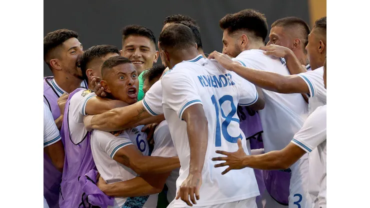 HARRISON, NEW JERSEY - JULY 04: Carlos Mejía #6 of Guatemala is surrounded by teammates after he scored the game winning goal during the second half of the Group D match against Guadeloupe the Concacaf Gold Cup at Red Bull Arena on July 04, 2023 in Harrison, New Jersey. Guatemala defeated Guadeloupe 3-2. (Photo by Elsa/Getty Images)