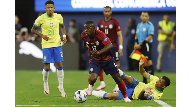 INGLEWOOD, CALIFORNIA - JUNE 24: Joel Campbell of Costa Rica challenges for the ball with Danilo of Brazil during the CONMEBOL Copa America 2024 Group D match between Brazil and Costa Rica at SoFi Stadium on June 24, 2024 in Inglewood, California. (Photo by Buda Mendes/Getty Images)