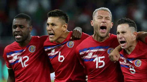 DOHA, QATAR - JUNE 14: Joel Campbell, Oscar Duarte, Francisco Calvo and Bryan Oviedo of Costa Rica sing their national anthem prior to the 2022 FIFA World Cup Playoff match between Costa Rica and New Zealand at Ahmad Bin Ali Stadium on June 14, 2022 in Doha, Qatar. (Photo by Mohamed Farag/Getty Images)