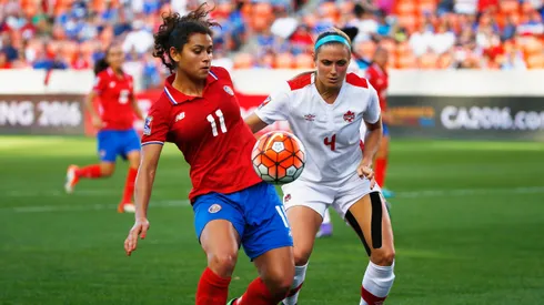 # of Canada battles for the ball with # of Costa Rica during the Semifinal of the 2016 CONCACAF Women's Olympic Qualifying at BBVA Compass Stadium on February 19, 2016 in Houston, Texas.