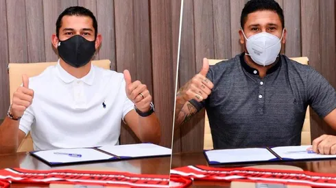 Ariel Rodríguez y José Guillermo Ortiz estampando su firma