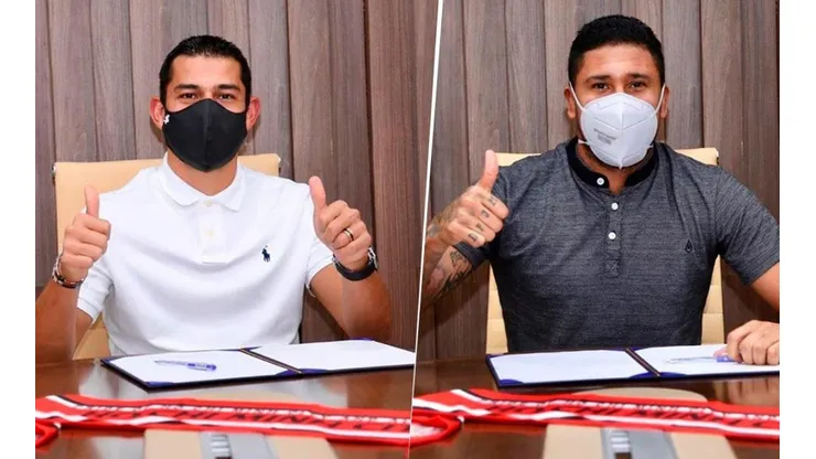 Ariel Rodríguez y José Guillermo Ortiz estampando su firma