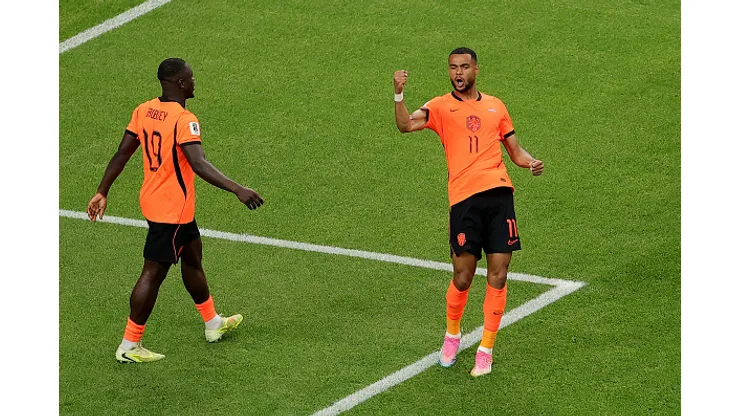 HOUSTON, TEXAS - JUNE 20: Cody Gakpo #11 of the Netherlands celebrates scoring his team's third goal during the FIFA World Cup 2026 Group F match between Netherlands and Sweden at Houston Stadium on June 20, 2026 in Houston, Texas. (Photo by Alex Slitz/Getty Images)