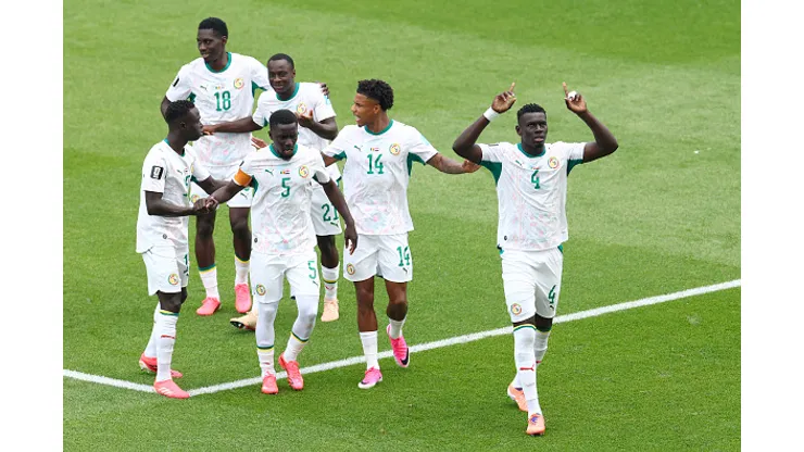 TORONTO, ONTARIO - JUNE 26: Abdoulaye Seck #4 of Senegal celebrates with teammates after scoring his team's first goal during the FIFA World Cup 2026 Group I match between Senegal and Iraq at Toronto Stadium on June 26, 2026 in Toronto, Ontario. (Photo by Robert Cianflone/Getty Images)