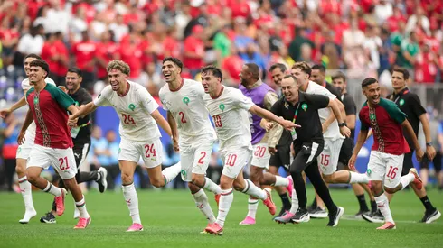 Marruecos festeja tras haber eliminado a Canadá.